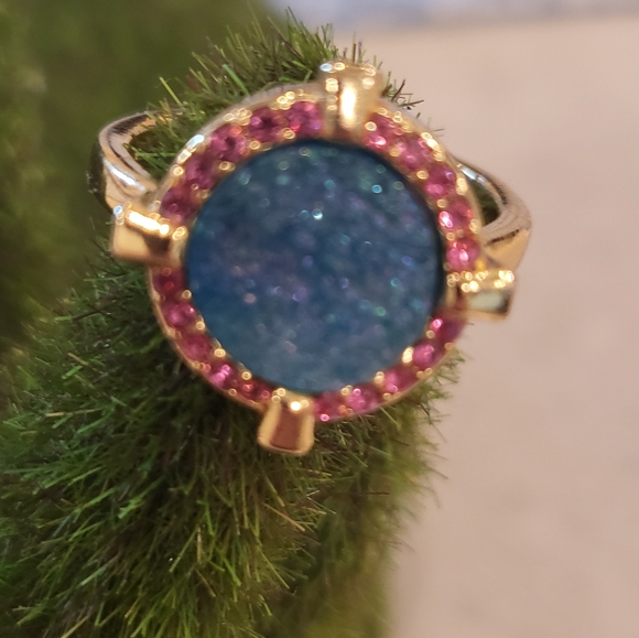 A gold-plated brass ring adorned with colorful semiprecious stones. - Picture 9 of 11